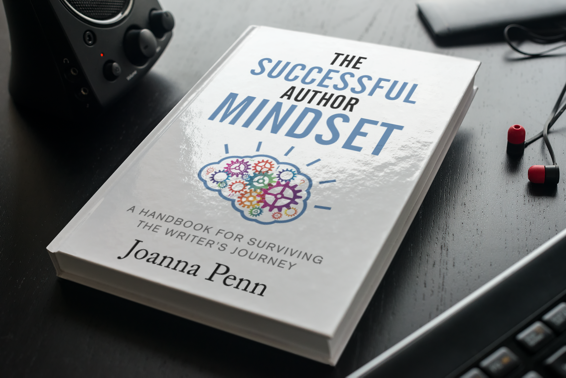 mockup-of-a-hard-cover-book-on-a-table-with-gadgets-3407-el1 mockup-of-a-hard-cover-book-on-a-table-with-gadgets-3407-el1